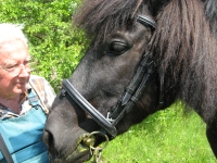 Václav Kefurt and Čenda the pony, which he was give from his colleagues at the Castle on his retirement
