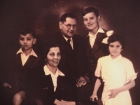 With his family in 1952