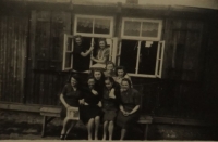 Emilie Vančurová (centre) with her friends in front of the work camp, Holýšov 1943