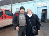 Vova, který se stará o sad rodiny Martinovských, a Darina Martinovská, 2019, Český Malín