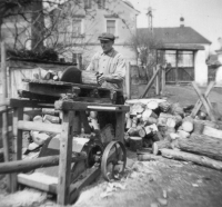 Father Arnošt Knobloch working on the family farm, 1954