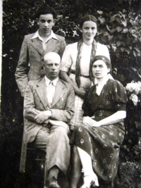 Martinovský family in Český Malín, Josef Martinovský and Marie with children Alice and Alois, 1943