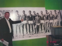 A large-scale photograph at the Olympic exhibition shows the bronze eight, Richard Nový is on the far right