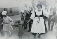 Emilie Pytelová at the head of youth organization at the feast in Ruprechtov, circa 1980
