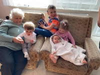With her great-grandchildren in 2021