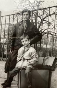 With his son at a bus stop, Lovosice, 1972