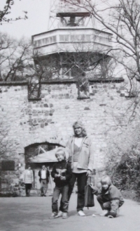Olga Mertlíková on Prague's Petřín Hill with her children in 1989