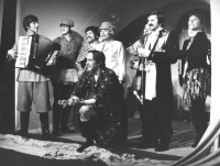 Jiří Lábus (in the front, squatting) in the play Twelve Chairs, photo by J. Černoch