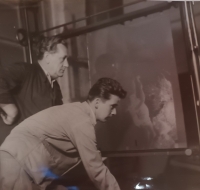Miloslav Šimek on the right at work in a dark giganto projection, Moravské tiskarské závody MTZ, operation Gottwaldov, building 52, Gottwaldov, 1955