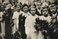 Baptism of Jiřina Mrázová (third from right), Roman Catholic exposition in Rozdělov near Kladno, May 9, 1940