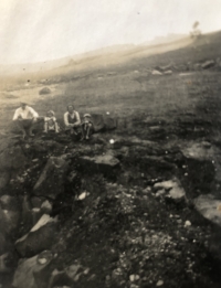 František Dušek's quarry and his family. In the background, the blurred silhouette of the Lipnice Castle, can be dimly seen, 1940s