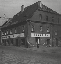 Alois Záruba in front of his local shop at III. square in the Old Most, 1947