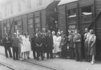 Josef Laufer (in the middle with a dark tie) as a worker of the repatriation commission in Terezín, 1945