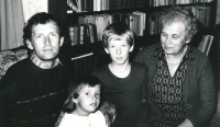 Martin Zlatohlavek (left) with his daughter (on his lap) and his mother (right) in 1989
