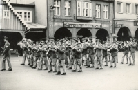 The brass band from Vrchlabí on the square in front of the hotel Labuť, the witness is at the end of the third row, Vrchlabí, 1986