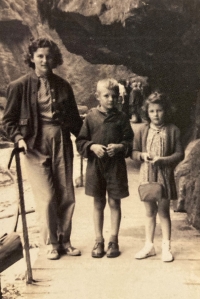 The witness with her niece and nephew in the Hřensko canyons, 1955