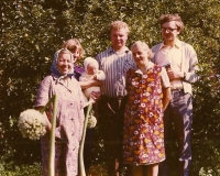 Peňáz family in the garden in Slavkovice, 1978