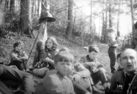 Jarmila Sikorová (with guitar) with the Hrčava scouts (on the right, the leader, priest Oldřich Prachař called Orel) / around 1969