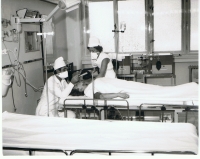 MUDr. Kučírek with a nurse during preparation for ventilation, Anaesthesiology and resuscitation department, hospital Ústí nad Orlicí, 1970s