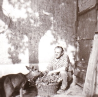 Ondrej Mazan sr. with tame doe, 1960s.