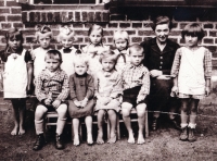 Aloisie Foltýnková (second from left in top row) in her kindergarten in Markvartovice / 1941