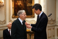 Miroslav Pravda receiving a medal from the French Ambassador in Palmes, 2014