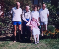Mr. and Mrs. Matyáš with their parents and their friend J. Skalička (far left) in front of their house in Otrokovice, after 1989