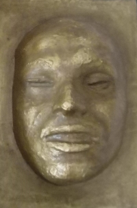 Pozlacená maska Jana Palacha