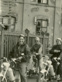 At the Czechoslovak Bus Transport Company in Opava, three friends, Alenka, Jarka and Maruška, set off on a trip around Czechoslovakia on their Pionýr motorcycles in 1957