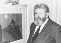 Father Vladimír Kaiser Sr (1922-1985), a famous amateur painter, by his painting "Tuchomyšl at Night" at an exhibition in the Na Terase Gallery