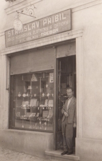 Jan Přibil's father Stanislav Přibil in front of his watchmaker´s shop, Třeboň