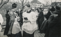 Jindřich Matoušek as an altar boy alongside Father Urban