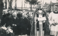 Jindřich Matoušek (front right) as an altar boy alongside Father Urban