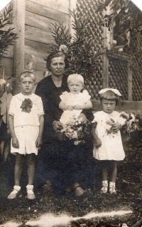 Grandchildren with grandmother, Volyn 1939