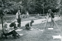 Painting together in the plein air around Drhleny, 1970s. Vladimír Vlk kneeling in the middle