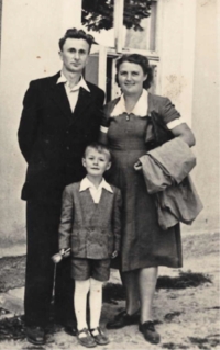 Six-year-old Ladislav Cvak with his parents, ca. 1955