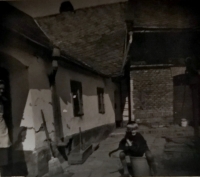 František Coufal in the courtyard of his family home in Černovír, 1940s