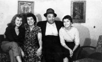 Eva Mikesova (left) with her parents and younger sister