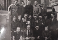 The photo shows a witness with his work colleagues.