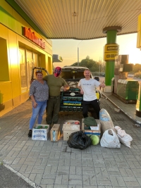 Передача гуманітарної допомоги. Донецька область, літо 2022 р.