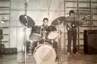 Volodymyr Kondur rehearsing with the school vocal and instrumental ensemble "KVANT"