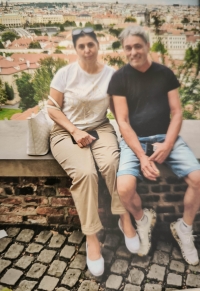 With her husband during vacation 