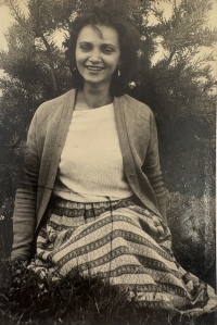 Oľga Kuzmová, the witness's adoptive mother