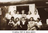 With her family 1947 (second from left, sitting)