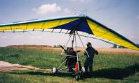 M. Růžička with a hang-glider