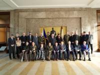 Vlasta Vyhnánková (na invalidním vozíčku). Setkání posledních žijících hrdinů od Sokolova - 1.ČS. samostatný polní prapor, Vítkov, březen 2010