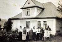 The Drong family in front of the house in Mosty u Jablunkova