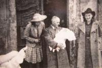 Grandfather during the christening of Doris Remešová