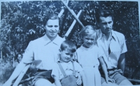 The Nohavička family shortly before their displacement from Brníčko in summer 1951 (Jarmila Nohavičková, children Jiří and Jarmila, and Jiří Nohavička) 
