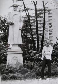 Vladimir Hajný next to a Stalin monument in Šumperk 